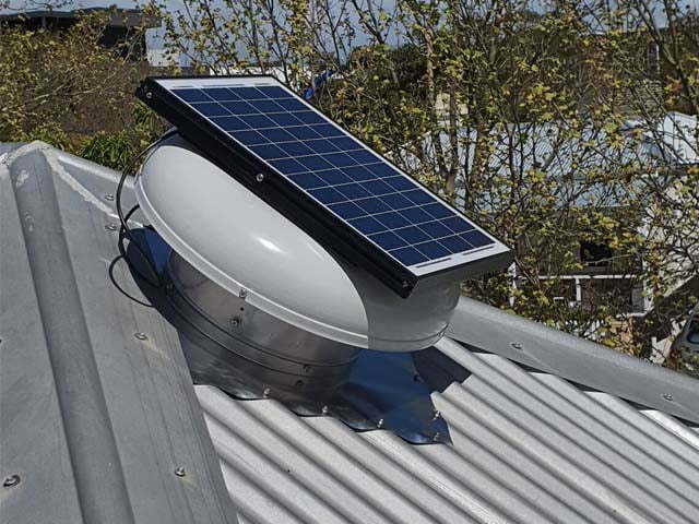 Solar roof ventilator on a tin roof