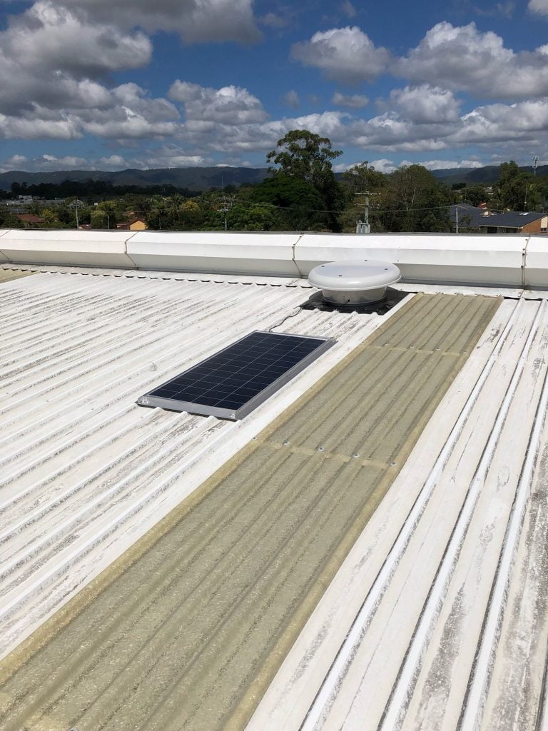 solar commercial whirlybird on a factory