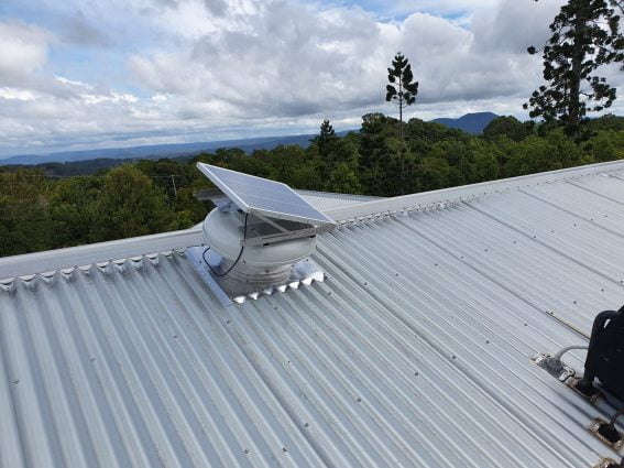 solar roof fan on a tin roof